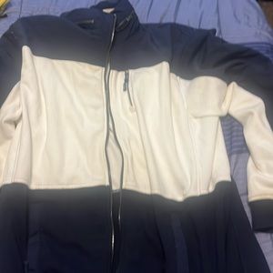 Tommy Hilfiger spring jacket slight browning on the white colour